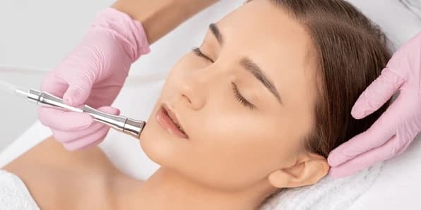 One Signature Facial Treatment with Diamond Microdermabrasion