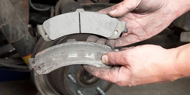 Front or Back Brake-Pad Replacement and a Brake Fluid Flush ( No European or Sports Cars)