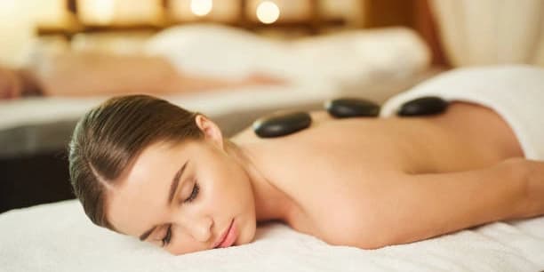 One Relaxed Hot Stone back massage with $15 Gift Card for Return Visit