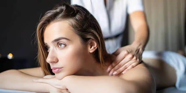 60 Minute Swedish or Deep Tissue Massage with Hot Stones (Includes Organic Aroma Oil and Cupping) (Valid M-Th)